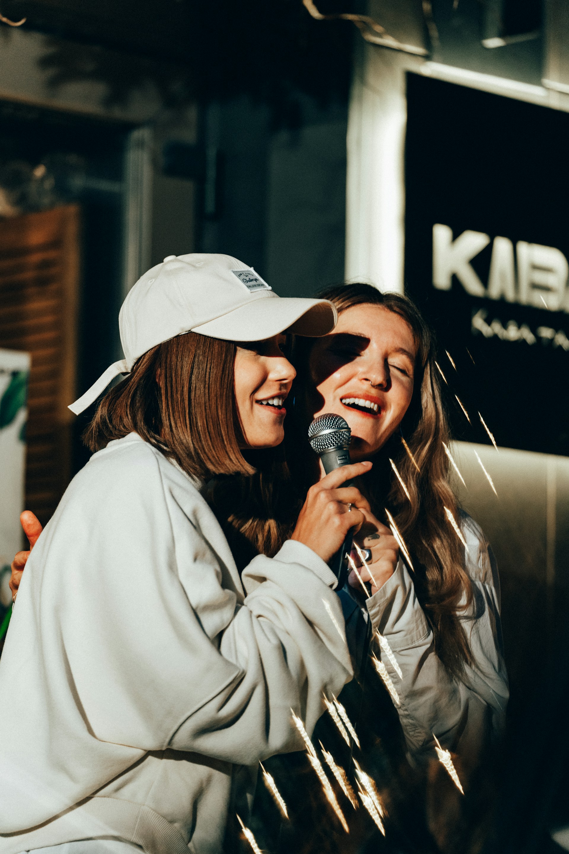 Two friends singing a duet